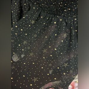 A beautiful black and gold dress